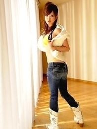 Emiri Seo poses in a room on floor Emiri Seo poses in a room on floor